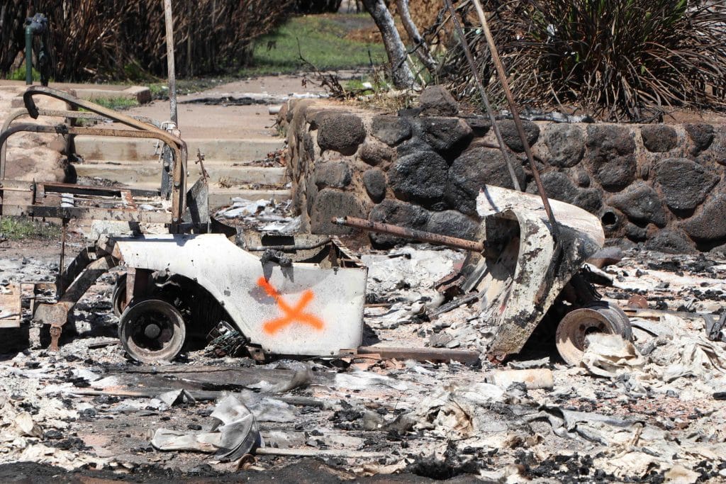 EPA workers finding many batteries during  hazardous material cleanup of Lahaina burned area